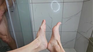 Foot job on COCK morning shower.